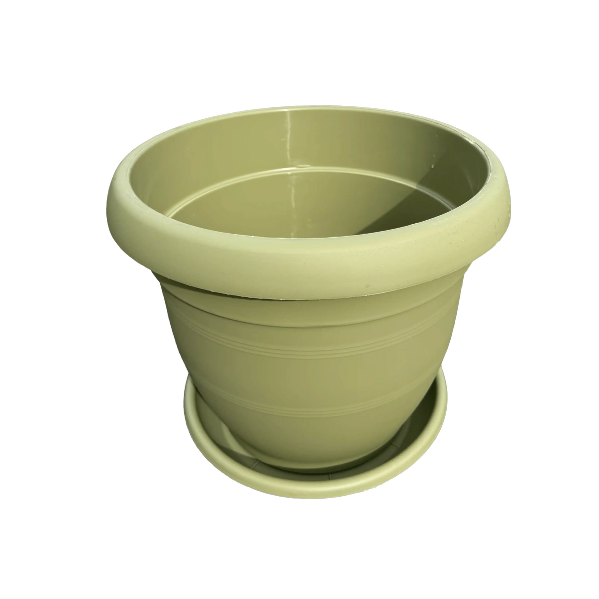 Green planter with saucer on a white background